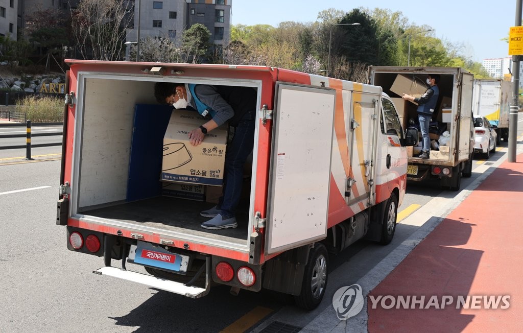 강동구 아파트 택배갈등 점입가경…고발에 파업 논의까지