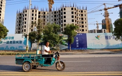 '파산 위기' 헝다, 23일 달러채권 이자 지불 못했다