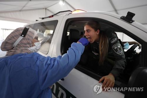 이스라엘서 의사 2명, 오미크론 변이 감염…부스터샷 접종자