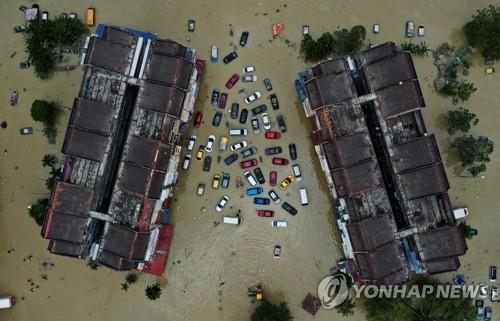 말레이시아 홍수 사망자 최소 48명…"지구 온난화 탓"