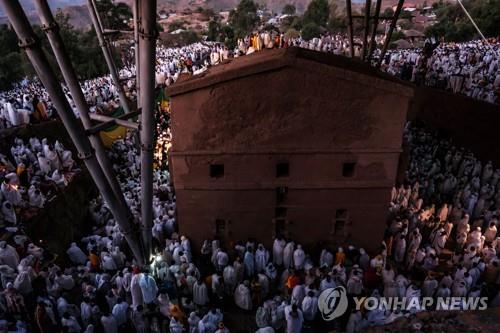 [월드&포토] 1월의 크리스마스 에티오피아…정치범 특사로 평화 기대