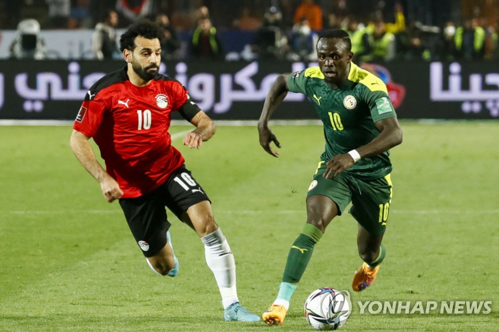Egito e Senegal avançam para as eliminatórias da Copa do Mundo ... Salah sorri primeiro