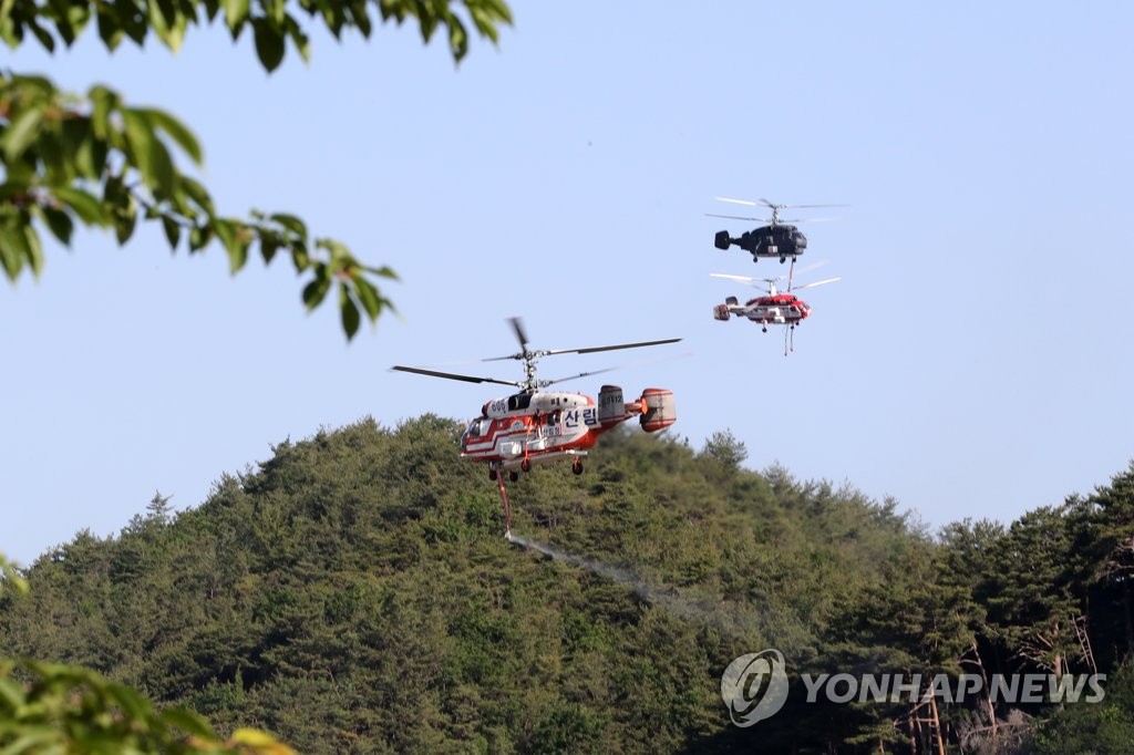 울진 산불 주불 23시간여 만에 진화…남은 불 정리 총력