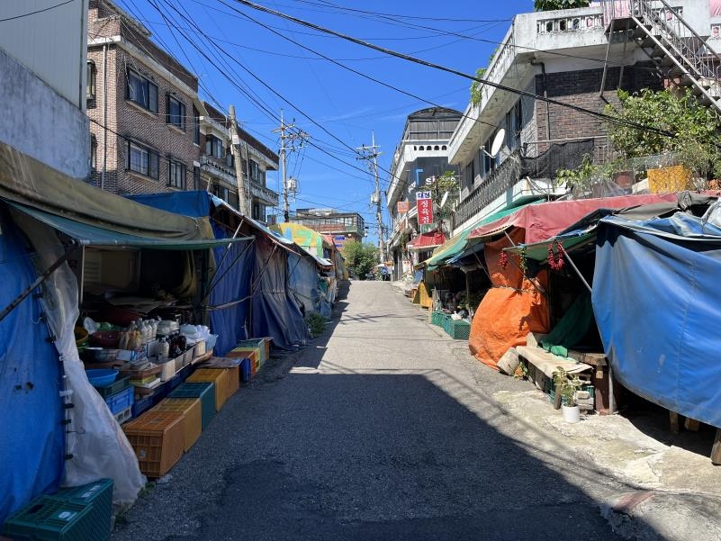 대통령 이사 오는 한남동…언덕 끝 도깨비시장은 '딴 세상'