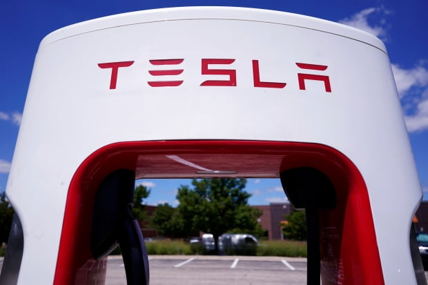 Oppenheimer Tesla downgraded to mid-market yield |  Hankyung. com