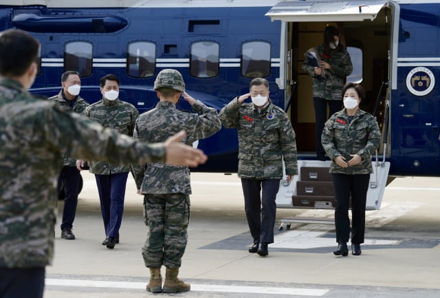 Former President Moon Jae-in and first lady Kim Jeong-sook arrive on Baengnyeong Island in the West Sea to encourage Marines for their hard work on December 23, 2021.  / Photo = Blue House