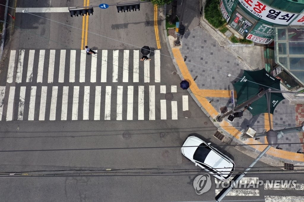 22일부터 우회전 신호등 어기면 범칙금 '최고 7만원'