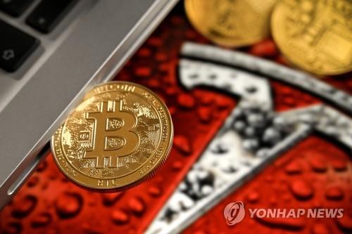 테슬라, 작년에 비트코인 1천730억원 순손실…보유분 75% 매도