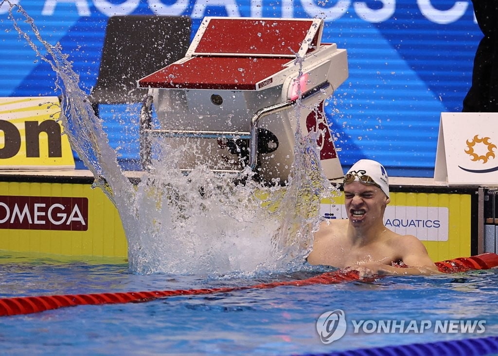 마르샹, 펠프스 제치고 '세계신기록'