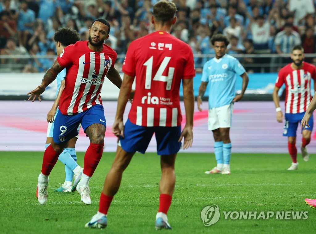 폭우도 뚫어낸 고품격 축구…AT마드리드, 맨시티에 2-1 승리