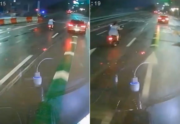 한 오토바이 운전자가 깜빡이를 키지 않고 차선을 변경한 뒤, 뒤이어 오던 대형 트럭에 깔려 숨졌다.  /사진=유튜브 채널 '한문철 TV' 캡처