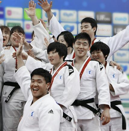 [아시안게임] 단일팀이었는데…북한 유도 김철광, 한국 강헌철과 악수 거부