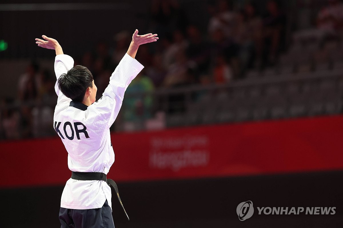 [아시안게임] 아킬레스건 파열 딛고 날아다닌 '1호 금메달리스트' 강완진