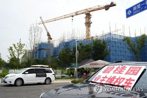 "中 비구이위안 달러채 처음으로 디폴트 선언"