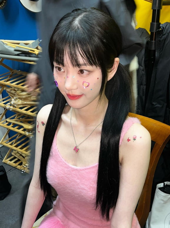 Yubi Lee, heart sticker, rose and butterfly tattoo and harlequin material