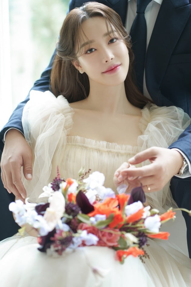 Go Woori's sudden announcement of "not an easy decision"