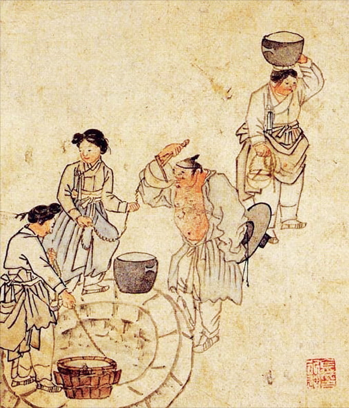 우물은 예부터 생명과 정화의 상징이었다. 조선시대 풍속도를 그린 김홍도의 ‘우물가’. 