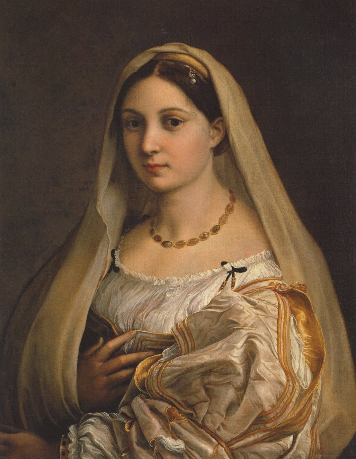 라파엘로의 베일 쓴 여인(1514~1516년경). 라파엘로의 가장 아름다운 여인 초상이다. 초상화 속 인물은 정면을 바라보고 있다. 지금이야 특별할 것 하나 없는 구도지만, 다빈치가 '모나리자'를 그리기 전까지 초상화라고 하면 고대 동전처럼 모델의 옆 얼굴을 묘사하는 게 일반적이었다. 다빈치와 라파엘로 이후로 서양의 초상화에서는 정면 얼굴을 그리는 방식이 보편화된다. /피렌체 팔라티나 미술관