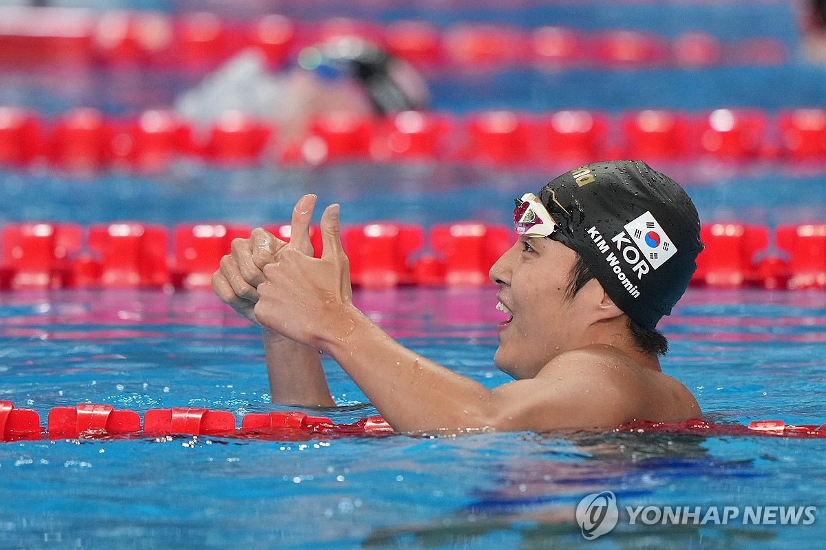 '도하 금' 김우민 "세리머니 못해 억울…파리 위해 아낀 걸로"