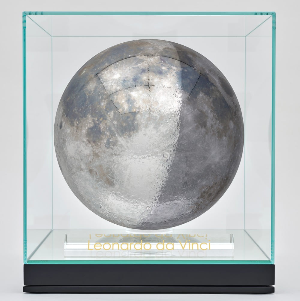 Rendering of Moon Phase (Leonardo da Vinci) by Jeff Koons Mirror-polished stainless steel with transparent color coating, gemstone, white gold, crystal glass, optical glass, mirrored glass, Corian 15 9/16 x 14 x 14 inches, 39.6 x 35.6 x 35.6 cm © Jeff Koons