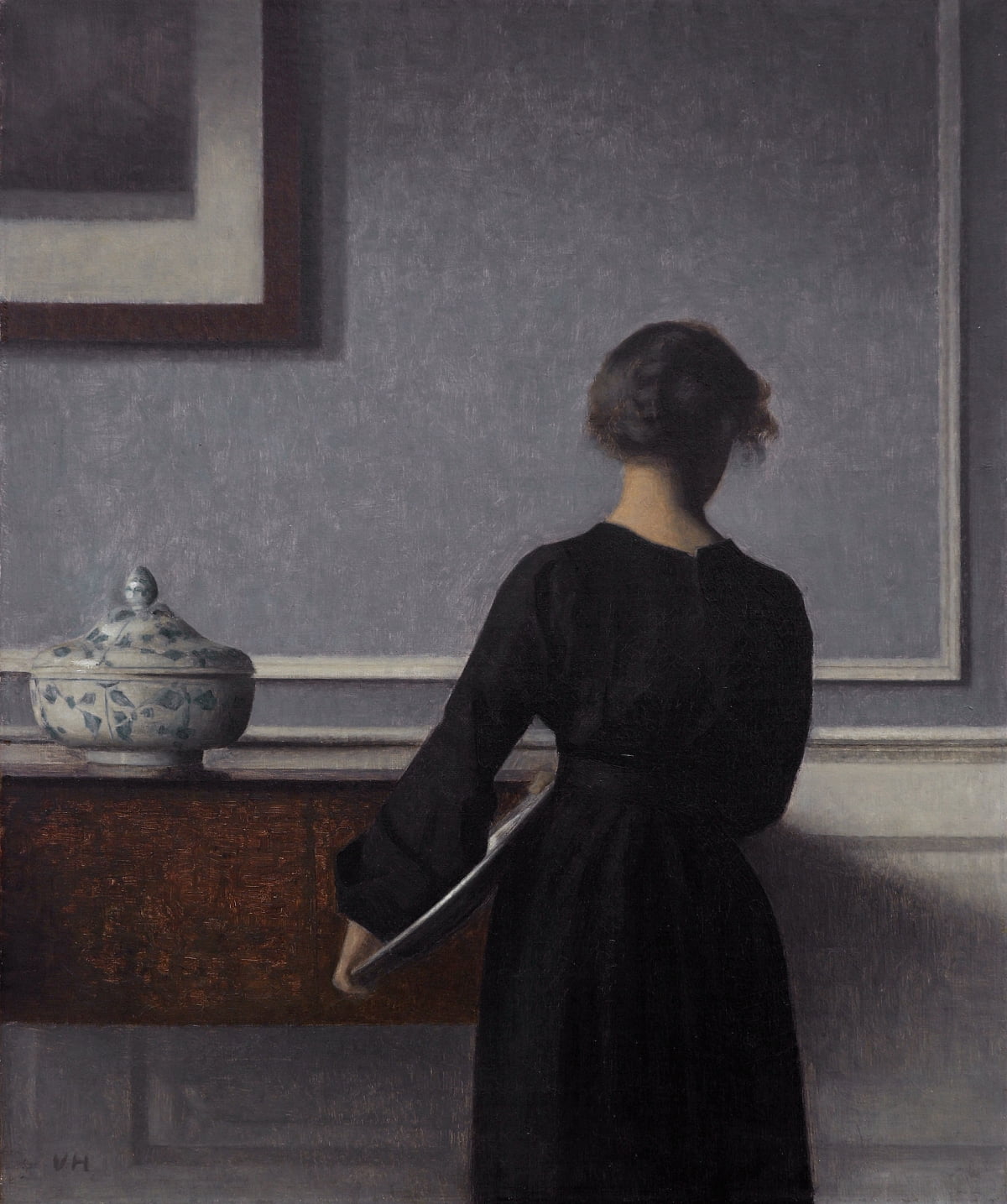 함메르쇠이의 'Interior with Young Woman Seen from the Back'.