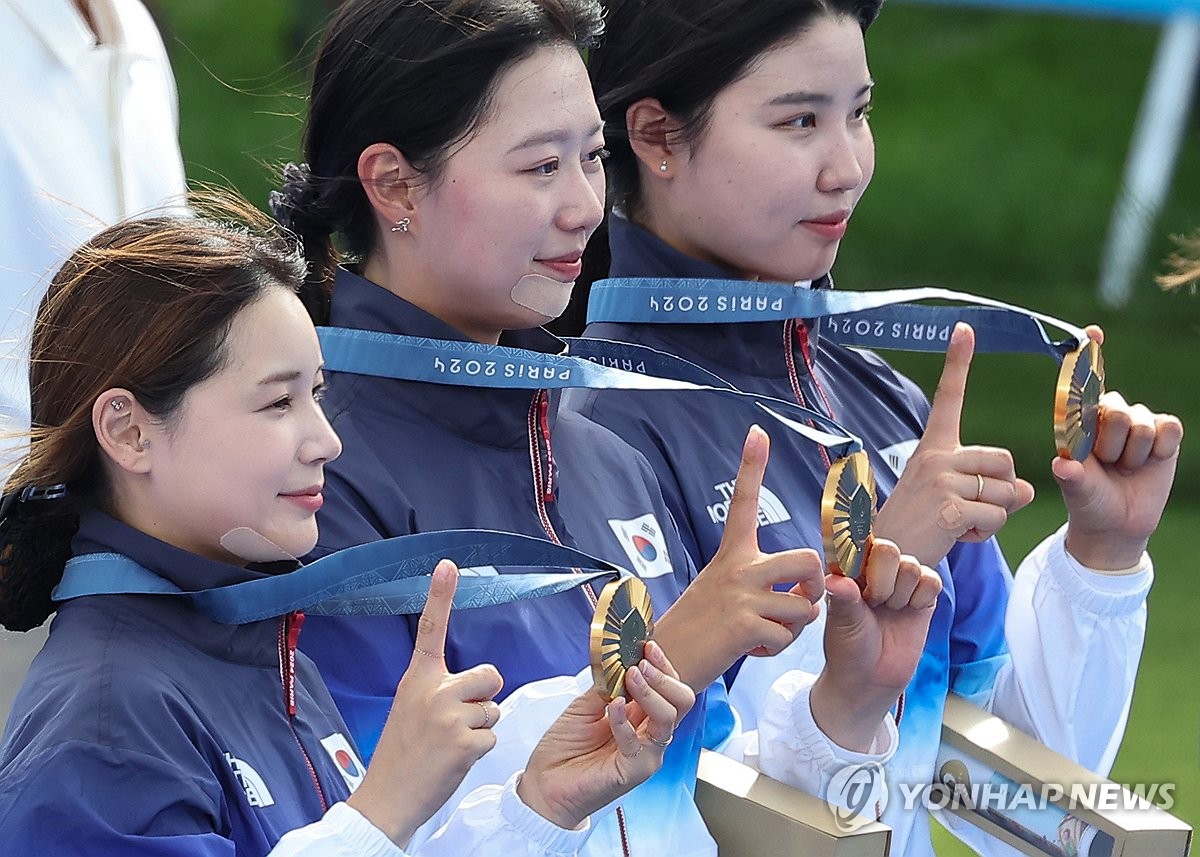 [올림픽] "뽑혀버린 걸 어떡해요"…경험 부족 우려 씻고 금메달 쏜 전훈영