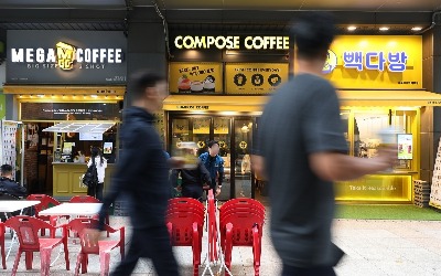 노란색 간판 '다닥다닥'…결국 필리핀 기업에 팔린 BTS 뷔 커피