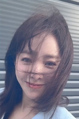 Han Ji-min Captivates with Windswept Charm in Latest Instagram Post