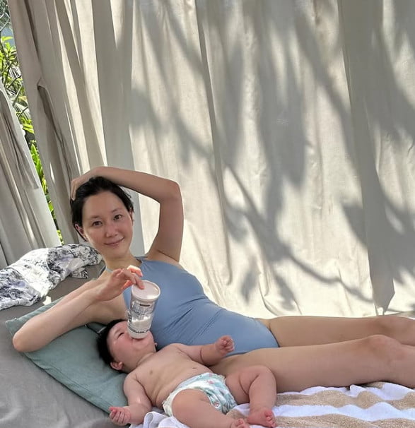 Actress Lee Yoo-young Shares Adorable Parenting Moments During Vacation