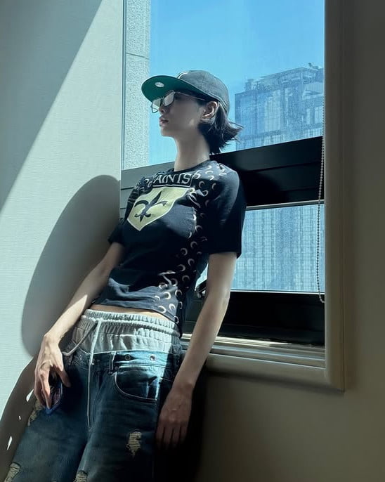 K-Pop Star Nana Stuns with Bold Fashion and Tattoo Revelation