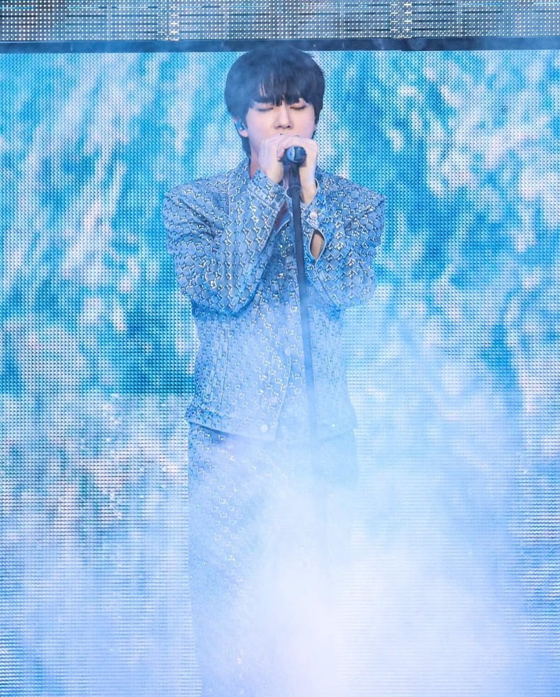 BTS's Jin Kicks Off First Fan Concert Tour with Stunning Visuals