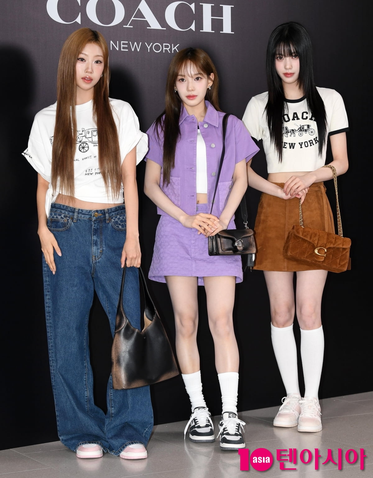 Members of K-pop Group izna Attend COACH Store Opening in Seoul