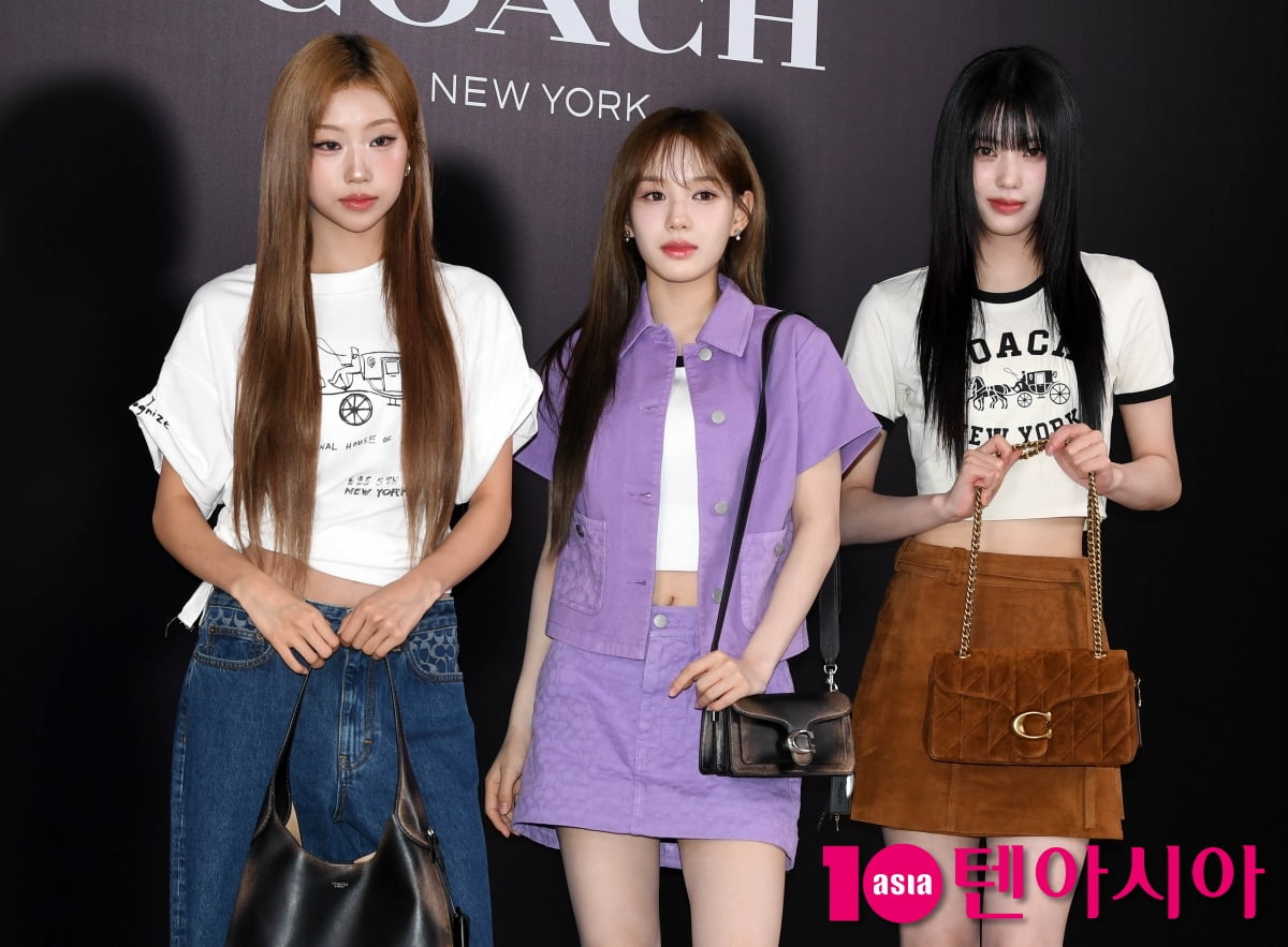 Members of K-pop Group izna Attend COACH Store Opening in Seoul
