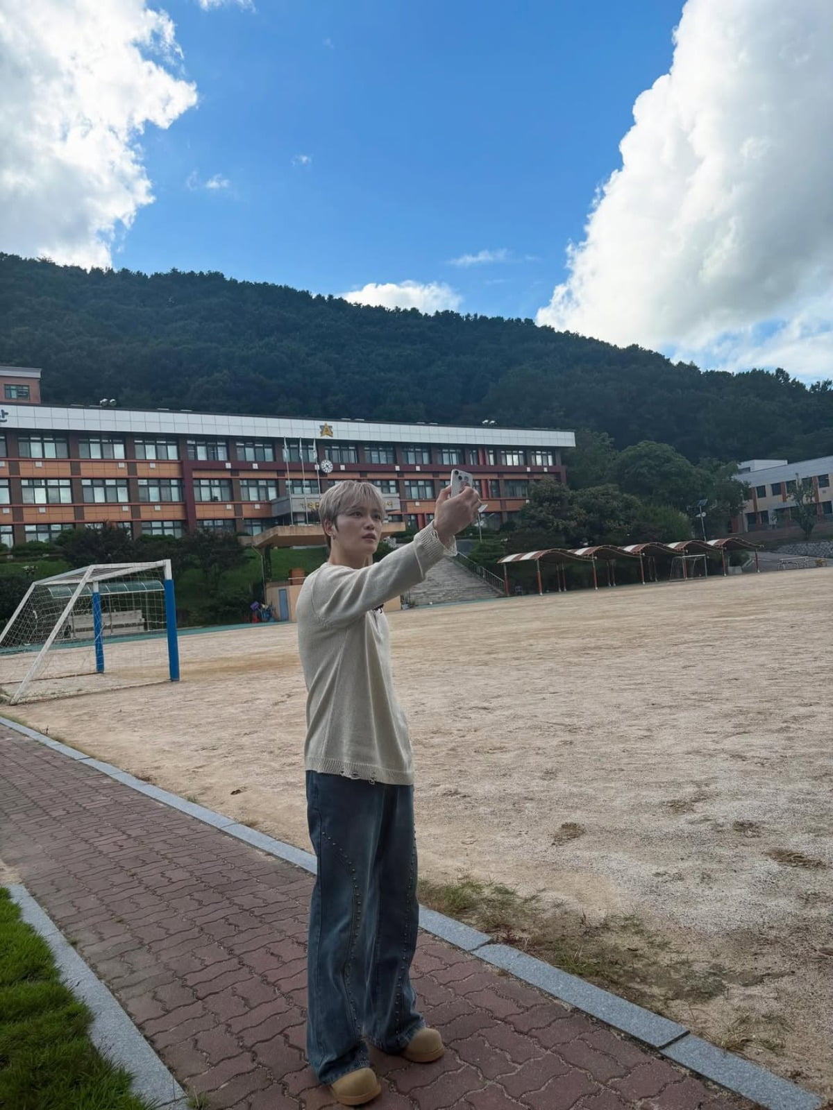 K-Pop Star Kim Jaejoong Reconnects with Alma Mater, Delights Fans with Nostalgic Visit