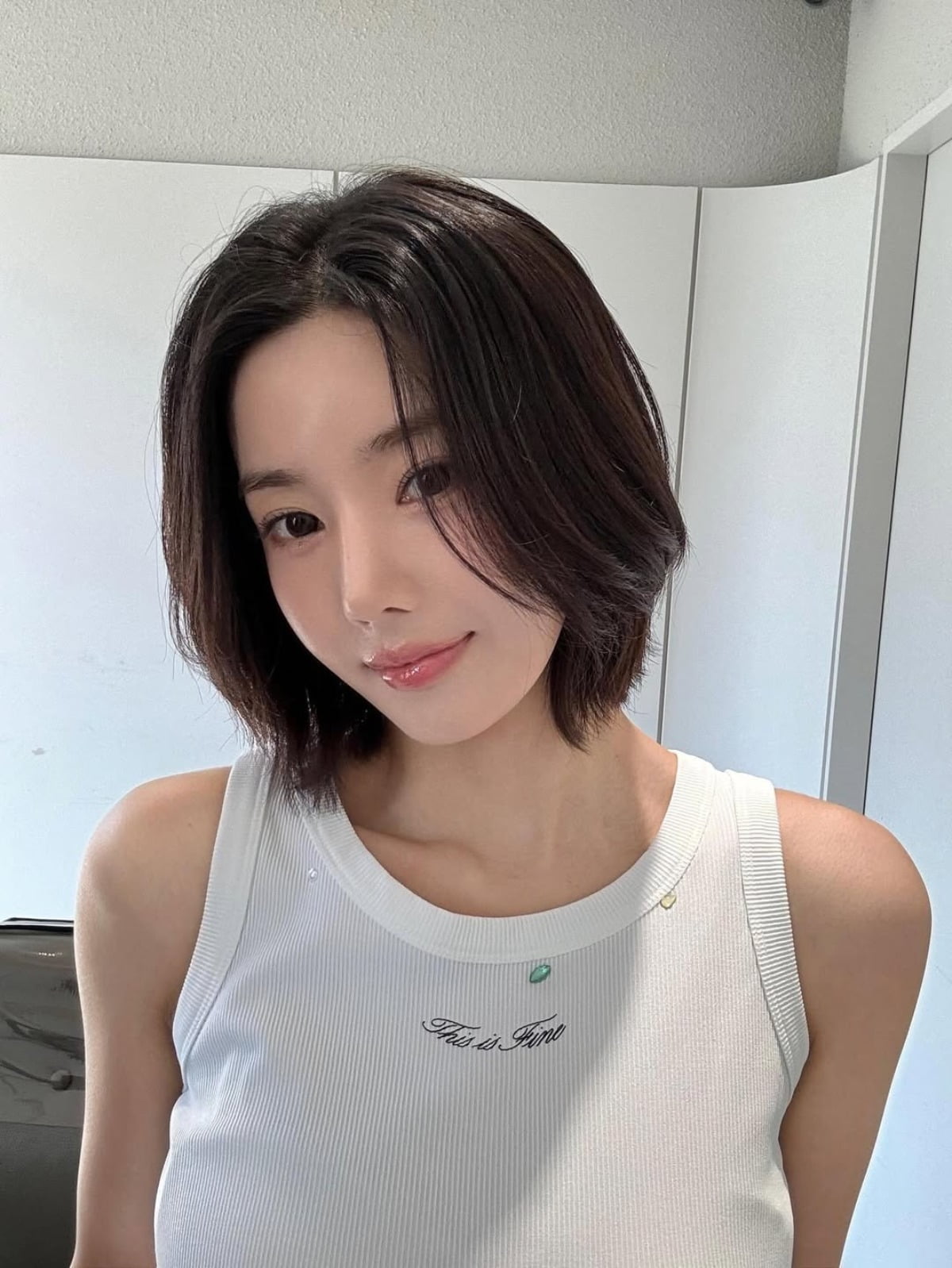 Kwon Eun-bi Stuns Fans with Radiant Selfies Amidst Recovery and Real Estate News