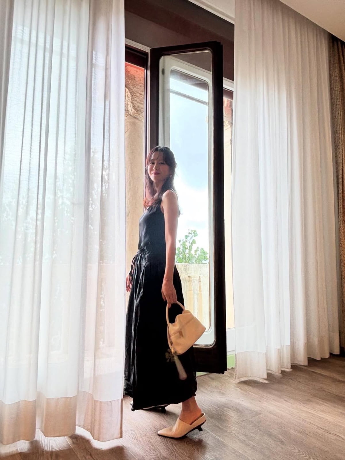 Son Ye-jin Shines in Stunning Photos Amidst Scenic Backdrop