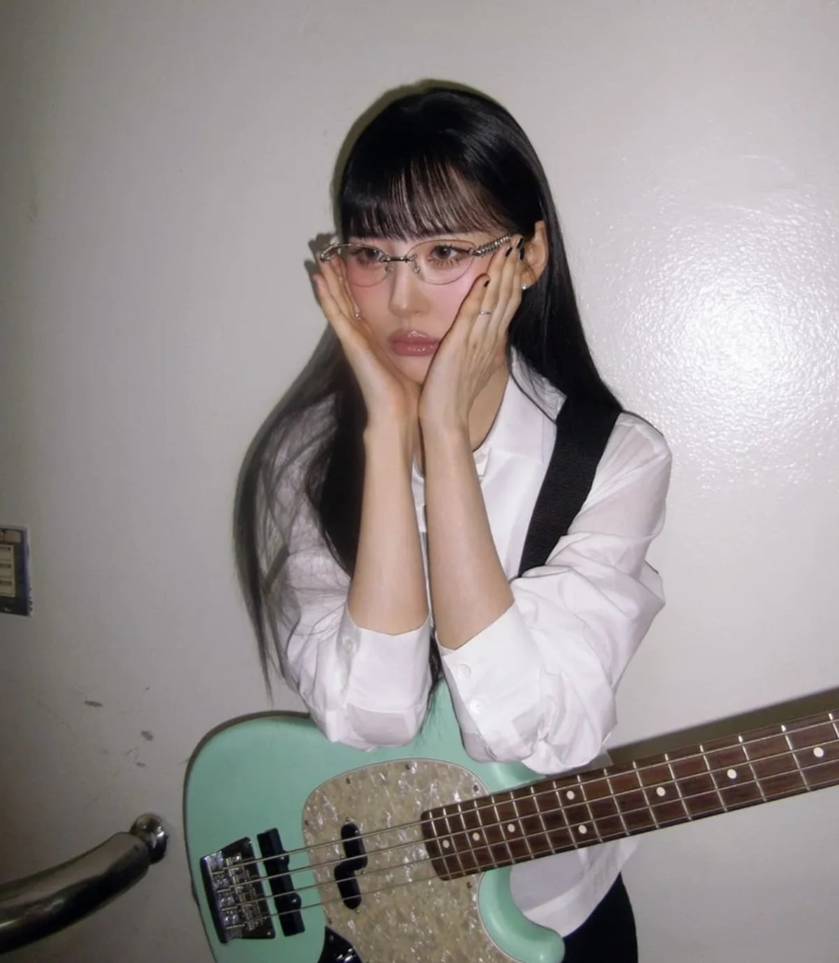 Sunmi Stuns in Chic White Shirt and Mint Bass Guitar Combo