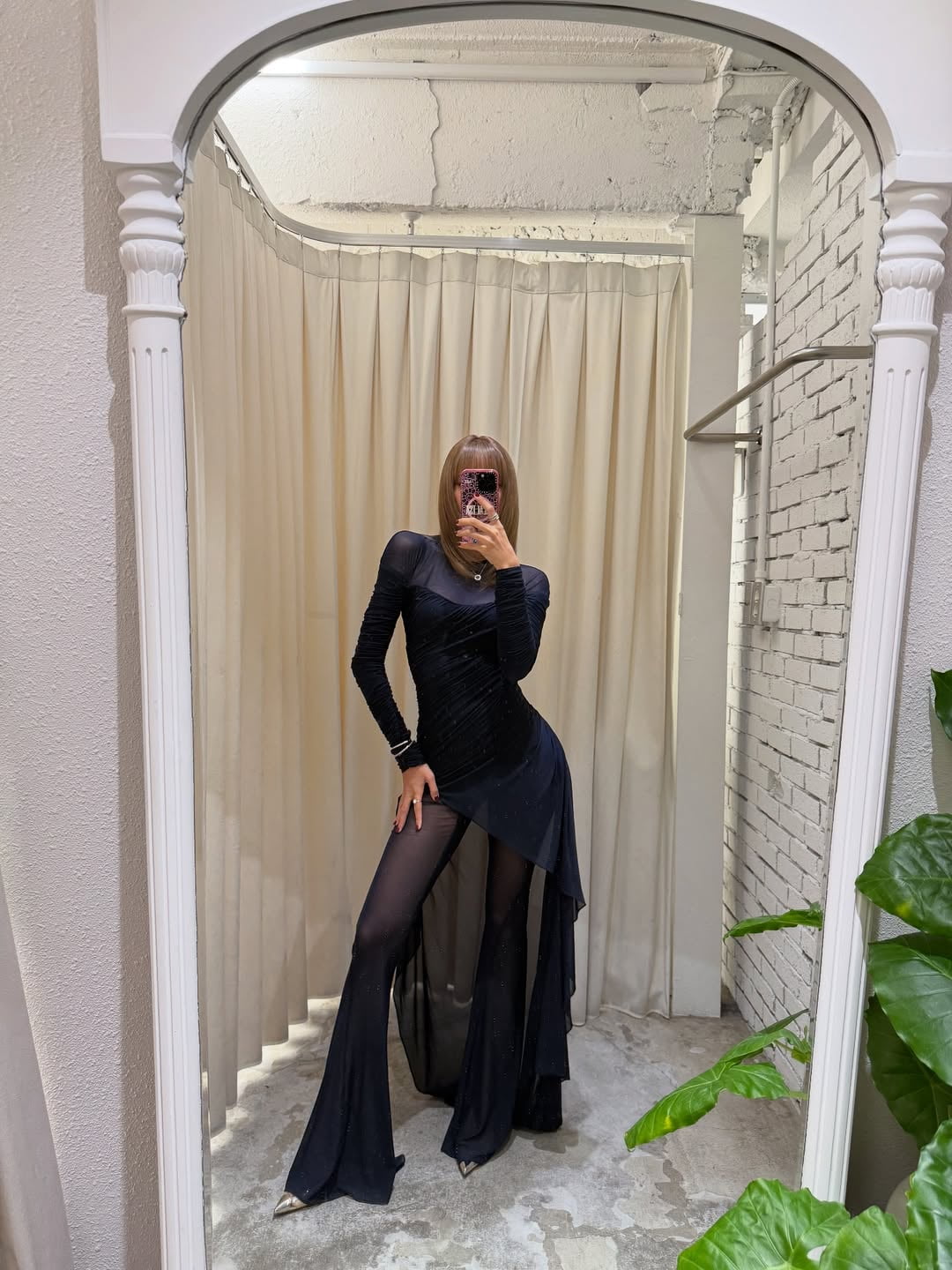 Lisa Shares Contrasting Moments with Sushi Bar Snap and Sheer Black Dress Mirror Shot