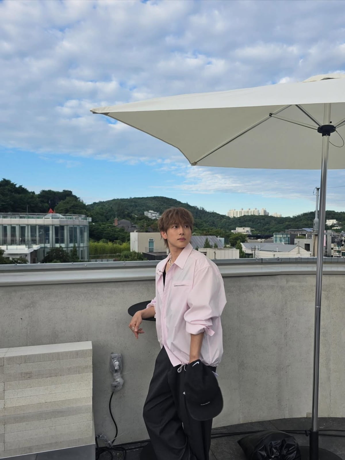 Im Si-wan Stuns in Pink Shirt on Rooftop Photoshoot