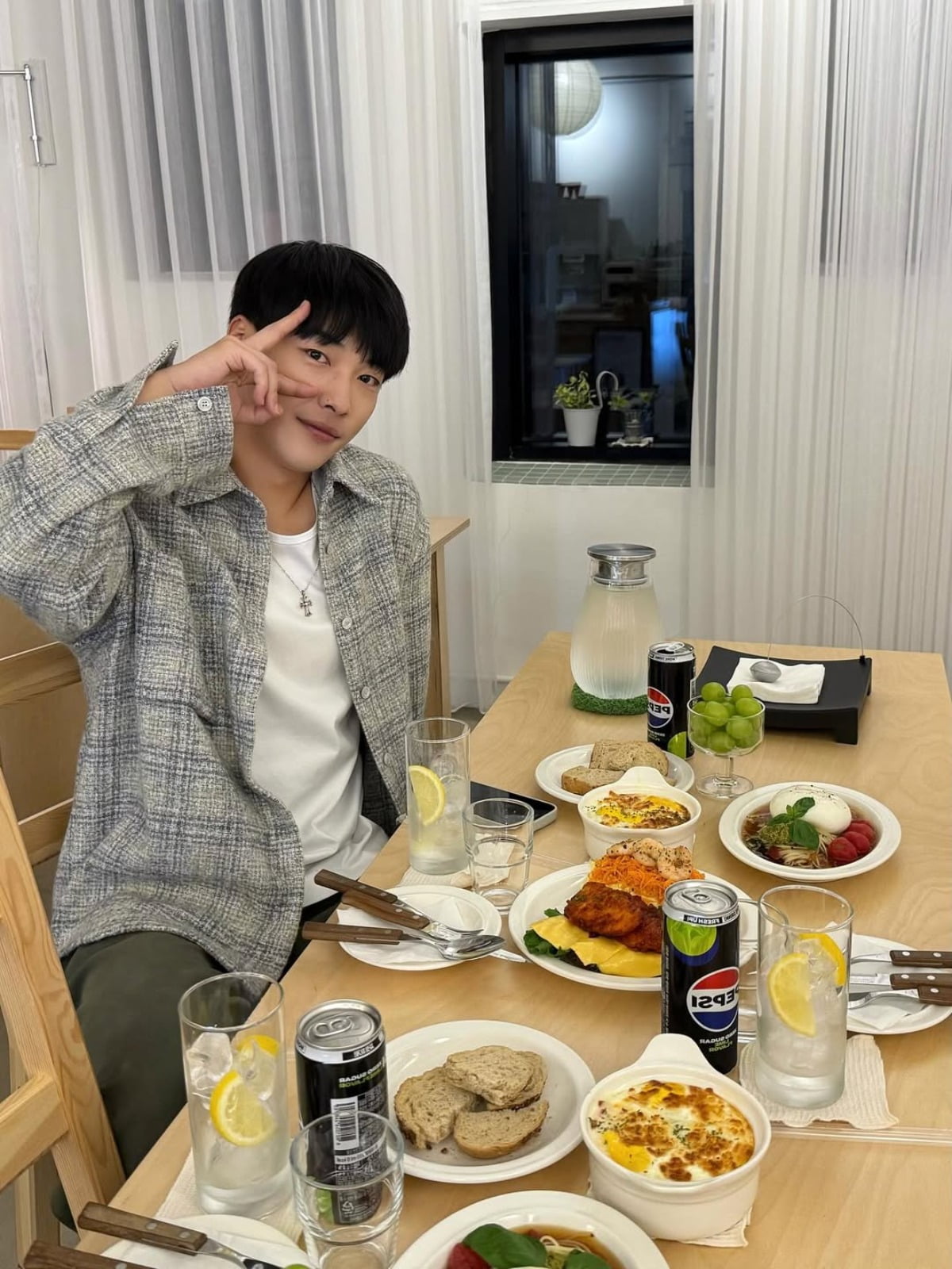 Woo Do-hwan Charms Fans with Cozy Cafe Look and Upcoming Netflix Role