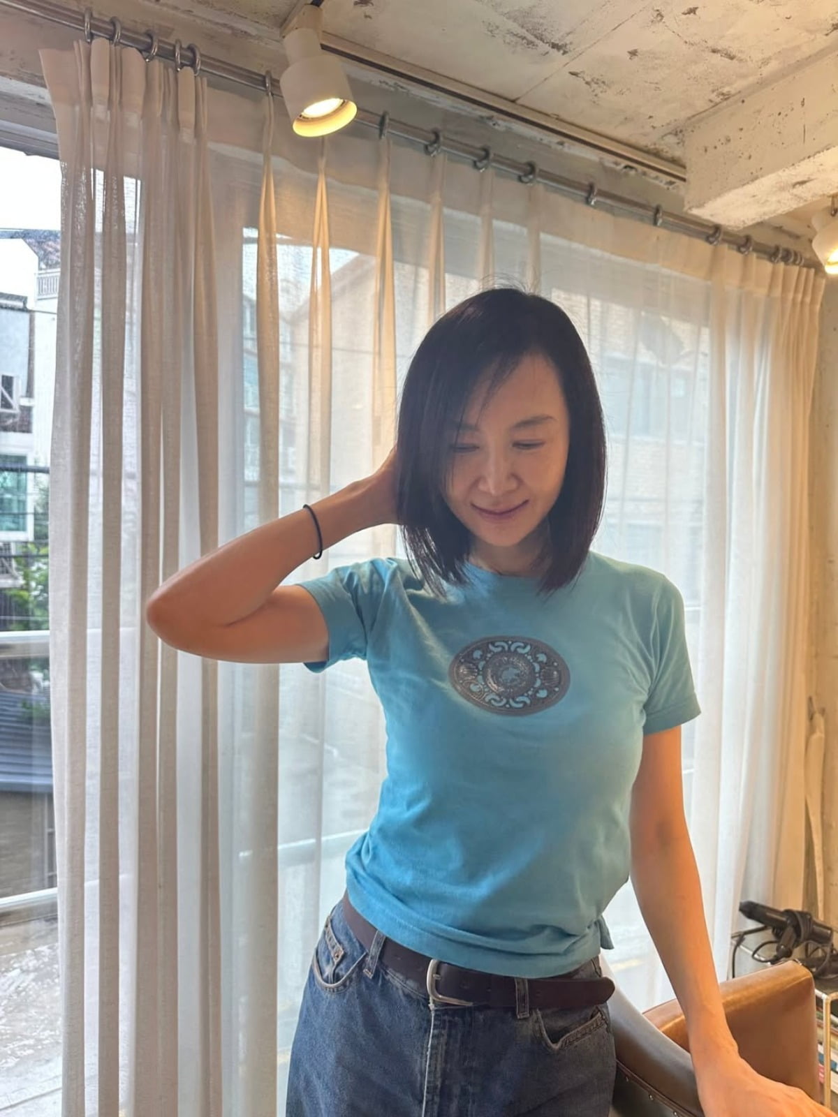 Korean Actress Chae Si-ra Stuns in Casual Denim and Blue Tee Look