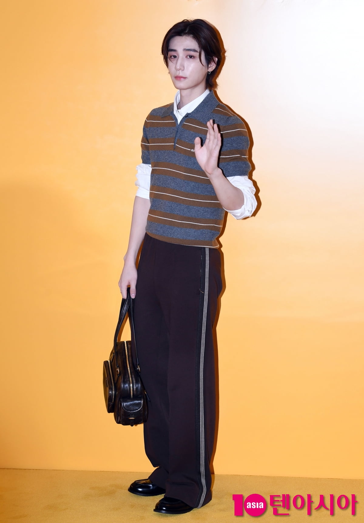 BOYNEXTDOOR's Leehan Shines at Miu Miu Atheneum Pop-Up Event in Seoul