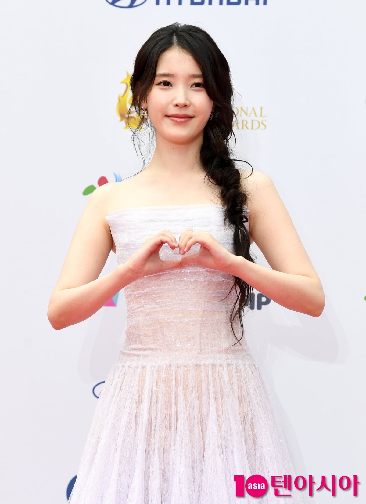 IU Graces the Red Carpet at the Seoul Drama Awards 2025