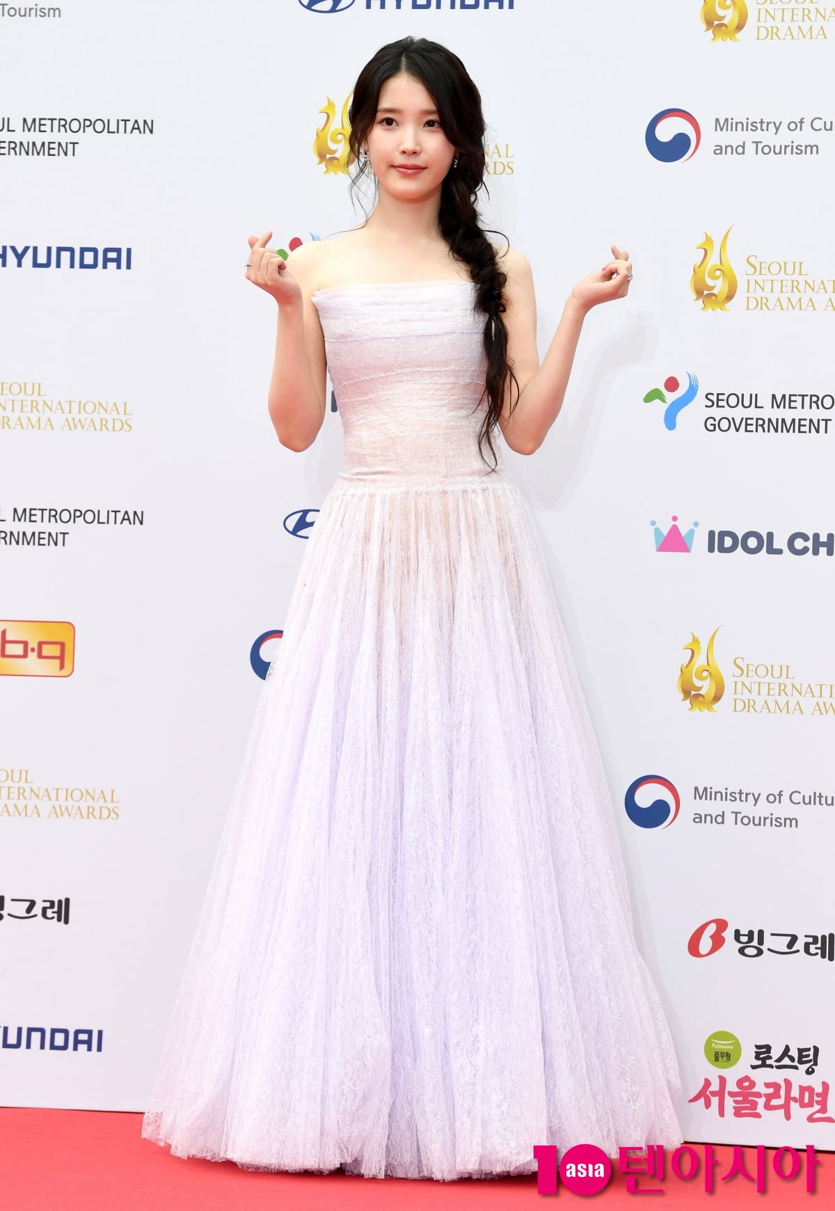 IU Shines on the Red Carpet at the Seoul Drama Awards 2025