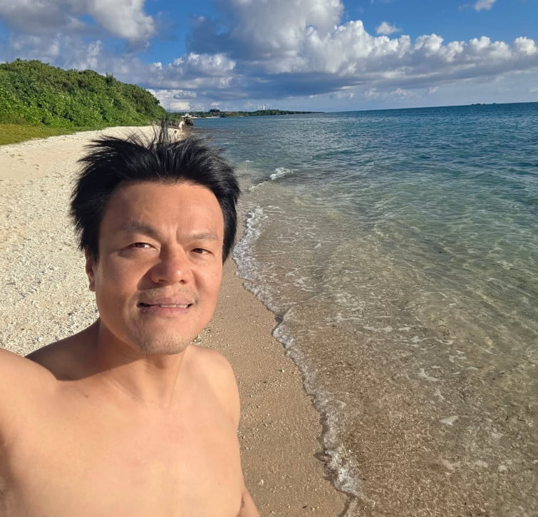 J.Y. Park Embarks on Family Vacation Amid New Cultural Role