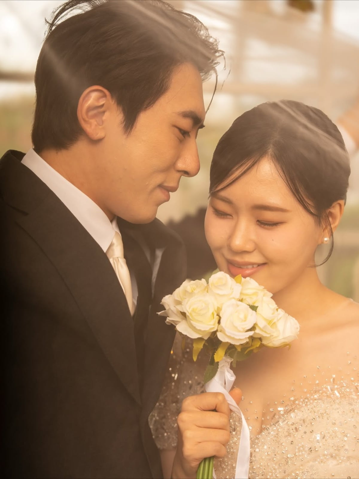 Comedians Kim Won-hoon and Um Ji-yoon Spark Buzz with Wedding Photoshoot