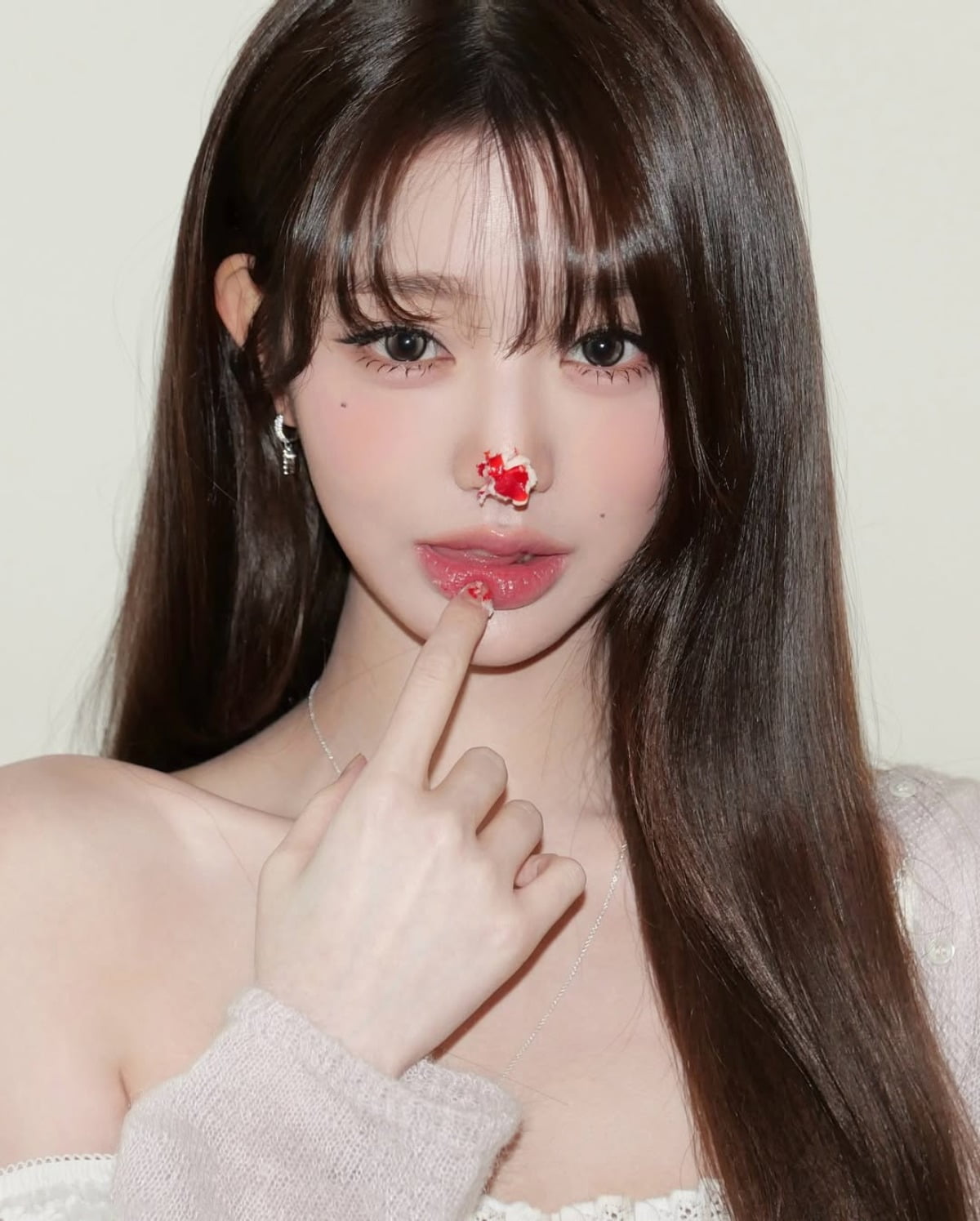 IVE's Jang Wonyoung Captivates with Doll-Like Visuals and Expanding Influence