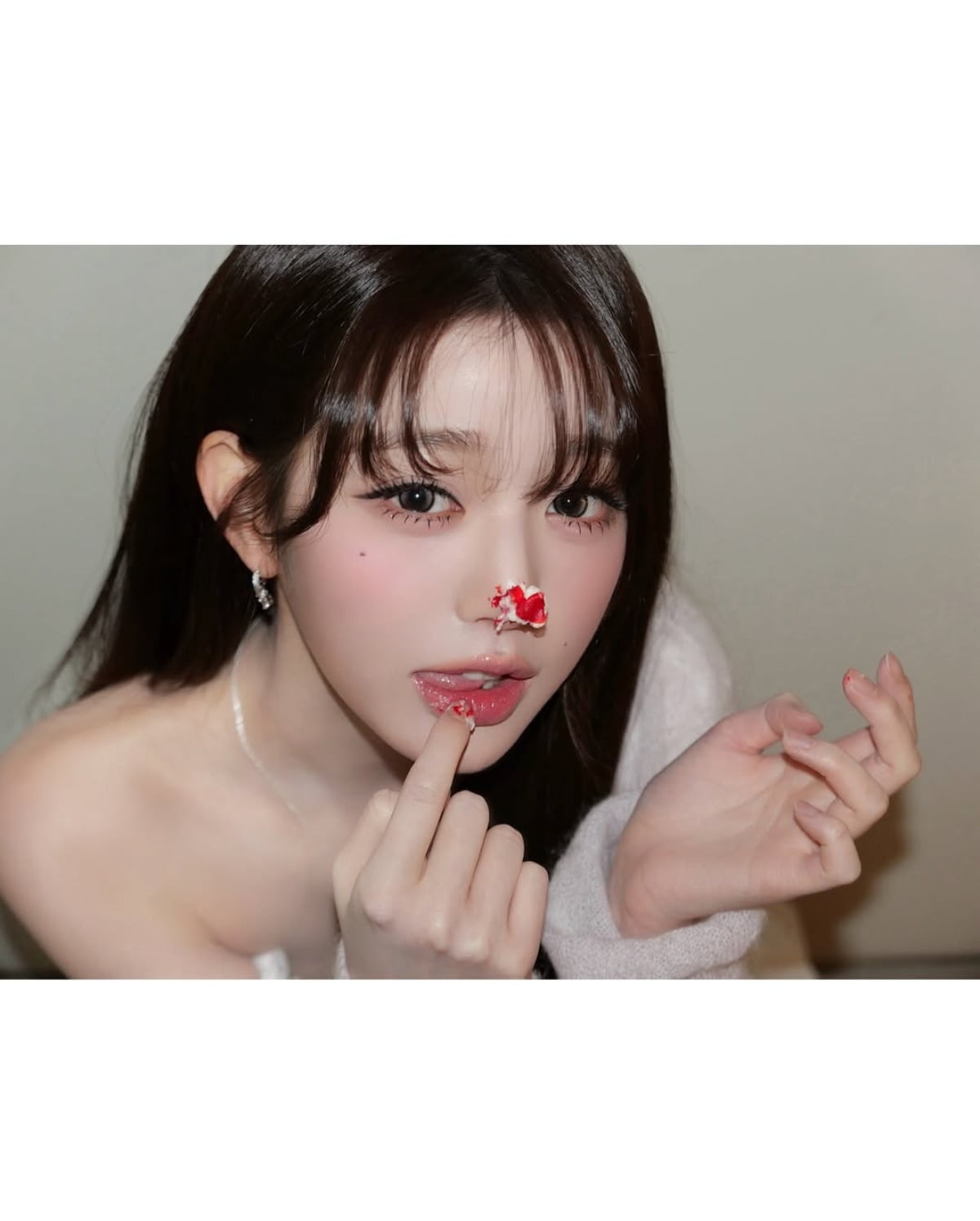 IVE's Jang Wonyoung Captivates with Doll-Like Visuals and Expanding Influence